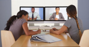 33803375 - professional team of multi-ethnic business colleagues having a video conference