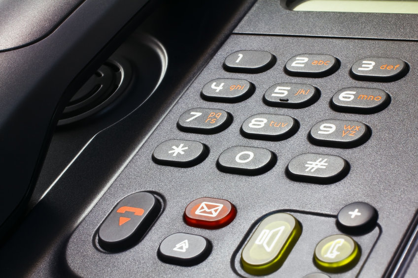 Close Up Of Black Desk Telephone Voip